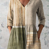 "Camille | Blusa Larga con Escote en V" can be rewritten as "Camille | Blusa Larga con Escote en Forma de V".